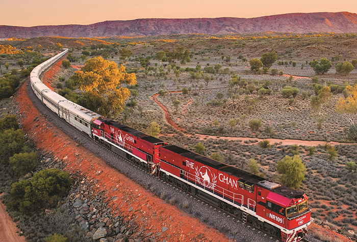 Multistate Holidays - photo of The Ghan train making its way through the Red Centre.